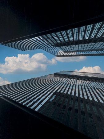 Commercial modern city. Bottom up view of glass buildings skyscrapers. business concept