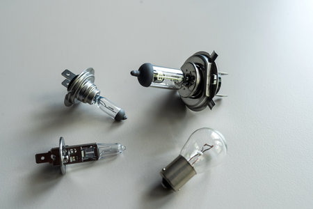 different car halogen headlight bulb H7 h1 h4 on white deskの写真素材