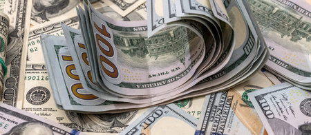pile of american dollar paper money background. Financial concept