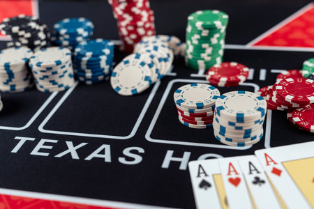composition of poker chips and playing card on casino table, luck fortune