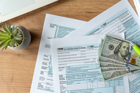 1040 Individual Income US tax form with dollars business finance concept