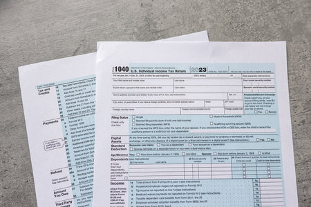 1040 blank tax form U.S. individual income return on desk. Deadline, tax seasonの写真素材