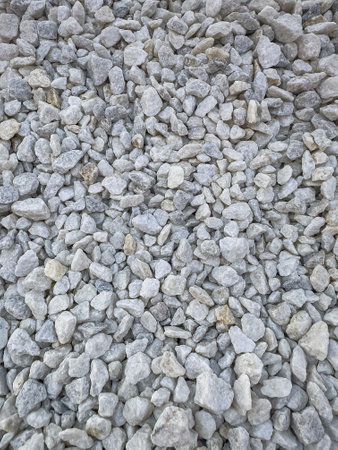 Small stones or decorative grey rocks as texture. Garden gravel backgroundの写真素材