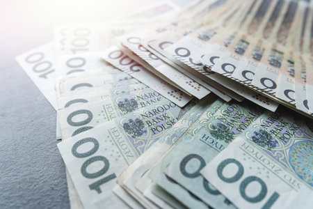 Financial background with many polish zloty banknotes 100 200 zl pln. Finance conceptの写真素材