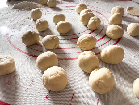 many small balls for dumplings, roll it for making vareniki. Uncook raw foodの写真素材