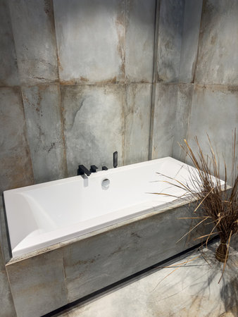 Interior residential bathroom stylish bathroom interior with ceramic white tubの写真素材