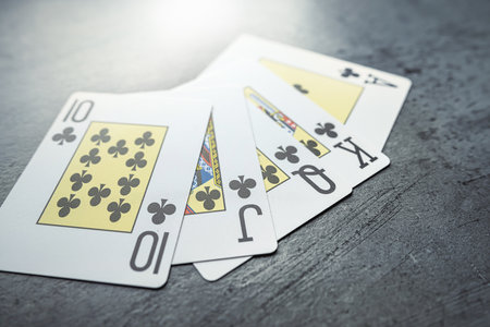 Set of Clubs Royal flush of five cards in the casino. Risk and win conceptの写真素材