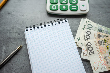 Blank notebook for making a shopping list with pln polish money. Buying conceptの写真素材