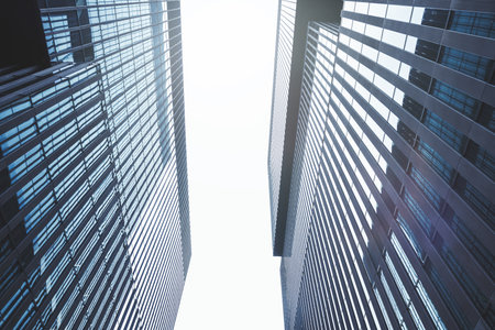 Bottom up view of modern glass office building. Commercial skyscraper buildingの写真素材