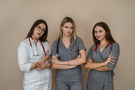 group of female nurse and medical staff wearing stethoscope isolated, studio shot. Health care conceptの写真素材