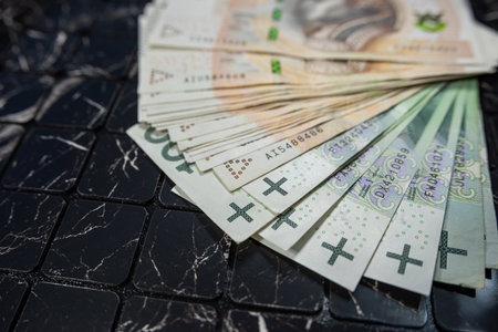 Close-up of 100 Polish Zloty PLN Banknotes on dark Background, financial concept investmentの写真素材