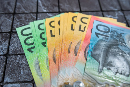 AUD different polymer color denominations Australian dollar bills on dark backgroundの写真素材