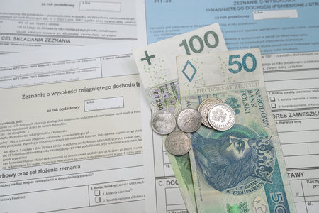 investment polish tax form PIT 37 38 pln zloty banknotes pen. Tax for time. Polish inscription, PIT aの写真素材