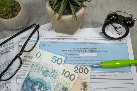 Polski emrti tas forms pit 36 37 38 with pen calculator glasses. Information on revenues from other sources and collected income tax advancesの写真素材
