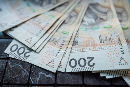 Close-up of 100 Polish Zloty PLN Banknotes on dark Background, financial concept investmentの写真素材
