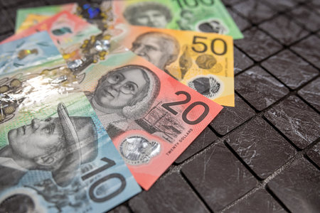 AUD different polymer color denominations Australian dollar bills on dark backgroundの写真素材