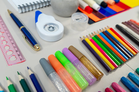School supplies on white background. Concept back to school. creative tools for school creative work on white wooden table. School supplies.の写真素材