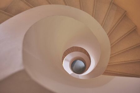 Looking down in modern spiral staircase