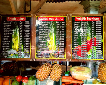 a list of fresh fruit and vegetable juices that you can order. you can also mix itの写真素材