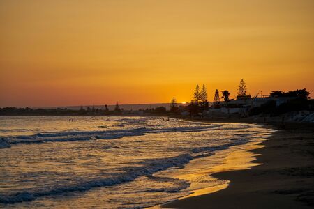 Sunset in the south - the gold of the south - Pachino beach - Sicilyの写真素材