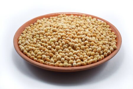 Dish with soy beans on white backgroundの写真素材