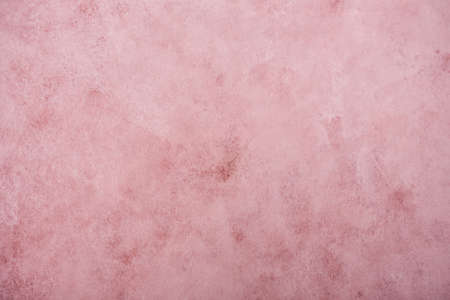 pink background with vintage mottled textureの写真素材