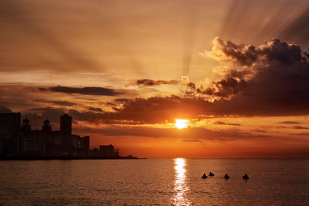 Sunset at sea, with the skyline of Havana (Cuba)の写真素材