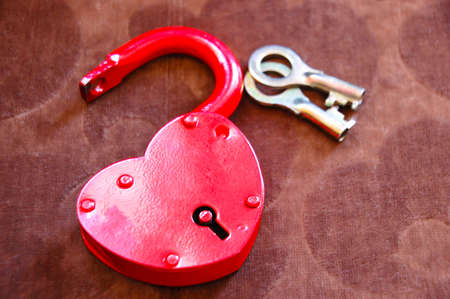 Red heart shaped lock with keysの写真素材