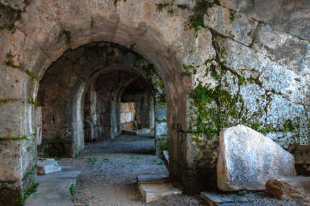 Stone arches in the ancient amphitheaterの写真素材