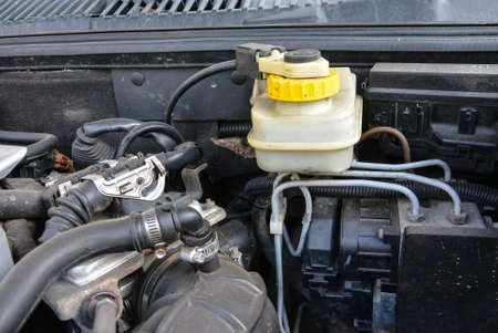 Tank of brake fluid under the hoodの写真素材