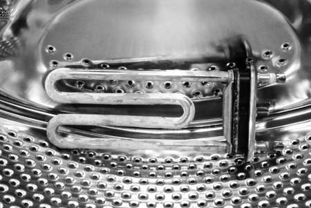 Old, defective part of the washing machineの写真素材