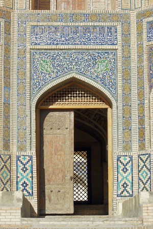 Historic gate to madrassa Miri Arab, Bukhara, Uzbekistanの写真素材