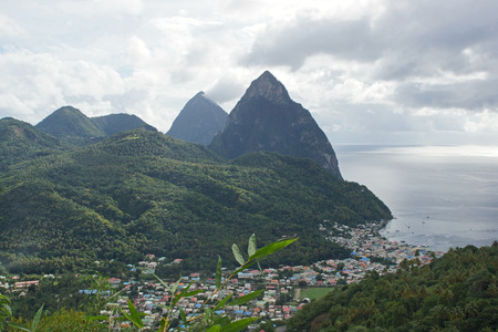 View over Soufriere with the famous volcano peaks of the Pitons in the background  Saint Lucia, Caribbean の写真素材