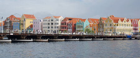 WILLEMSTAD, CURACAO - DECEMBER 10, 2013  Panorama of the Queen Emma Bridge in front of the Punda district on December 10, 2013 in Willemstad, Curacao, ABC Islands,のeditorial素材