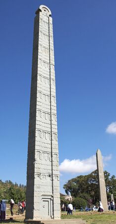 AXUM, ETHIOPIA - November 30, 2014: People visiting the ancient steles of Axum During The Hidar Zion Ceremony on November 30, 2014 in Ethiopia, Africaのeditorial素材