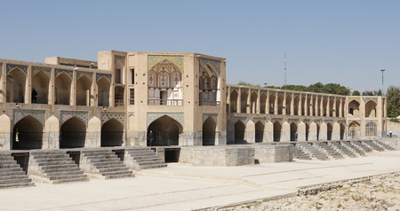 ISFAHAN, IRAN - OCTOBER 11, 2016: Khaju bridge crossing parched Zayandehrud river on October 11, 2016 in Isfahan, Iranのeditorial素材