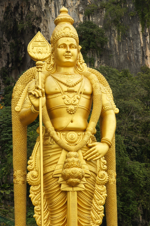 BATU CAVES, MALAYSIA - JANUARY 29, 2011: Statue of Goddess on the stairs to the holy caves of Batu on January 29, 2011 in Malaysiaのeditorial素材