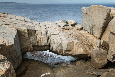 Natural bridge within the amazing Torndirrup National Park close to Albany, Western Australiaの写真素材