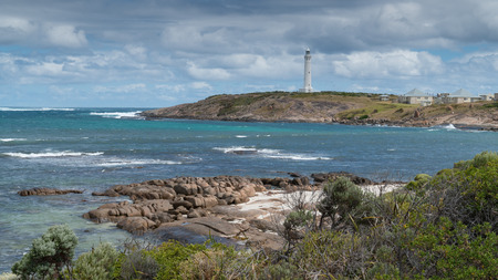Lighthouse on Cape Leeuwin with panoranic view over the coastline at the most southwestern point of Australiaの写真素材