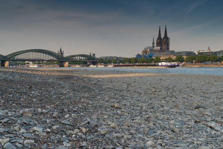 COLOGNE, GERMANY - JULY 20, 2018: Prolonged drought in Germany, low water of the Rhine river in Cologne at early morning time on July 20, 2018 in Germanyのeditorial素材