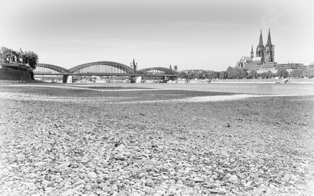 COLOGNE, GERMANY - JULY 27, 2018: Drought in Germany, low water of the Rhine river in Cologne at early morning time on July 27, 2018 in Germanyのeditorial素材