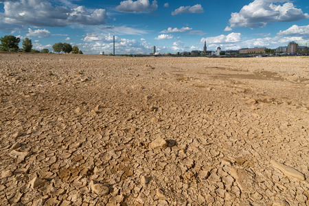 DUESSELDORF, GERMANY - AUGUST 11, 2018: Drought in Germany, low water of the Rhine river with the cityscape of Duesseldorf on August 11, 2018 in Germanyのeditorial素材