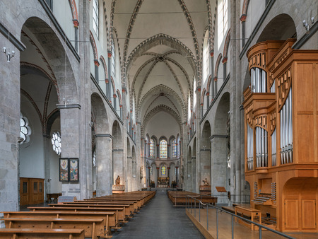 GERMANY, COLOGNE - JULY 26, 2018: View throught the main aisle of the basilica Saint Kunibert on July 26, 2018 in Cologne, Germanyのeditorial素材