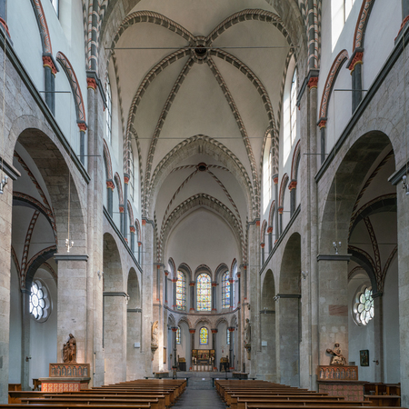 GERMANY, COLOGNE - JULY 26, 2018: View throught the main aisle of the basilica Saint Kunibert on July 26, 2018 in Cologne, Germanyのeditorial素材