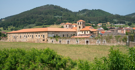 Panoramic view to the old monastery of Cornellana, landmark on the Camino de Santiago trail between Grado and Salas, Asturias, Spainのeditorial素材