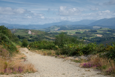 Panoramic landscape along the Camino de Santiago trail between Grandas de Salime and Fonsagrada, Asturias, Spainの写真素材