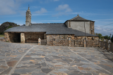 Old church Santa Maria Magdalena in sunlight with blue sky, Penafonte, Camino de Santiago close to Grandas de Salime, Asturias, Spainの写真素材