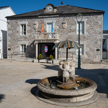 Historic townhall of Castroverde with children water well, Camino de Santiago trail, Calicia, Spainのeditorial素材
