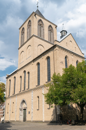 GERMANY, COLOGNE - JULY 26, 2018: Low angle view to the portal of the Romanesque basilica Saint Kunibert on July 26, 2018 in Cologne, Germanyのeditorial素材