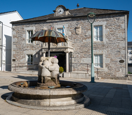 Historic townhall of Castroverde with children water well, Camino de Santiago trail, Calicia, Spainのeditorial素材